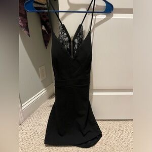 Black mini dress with lace back